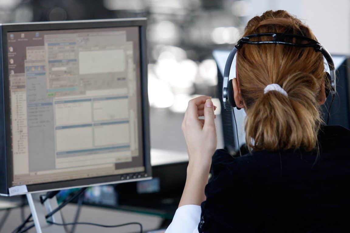 Woman with headset facing away 1152